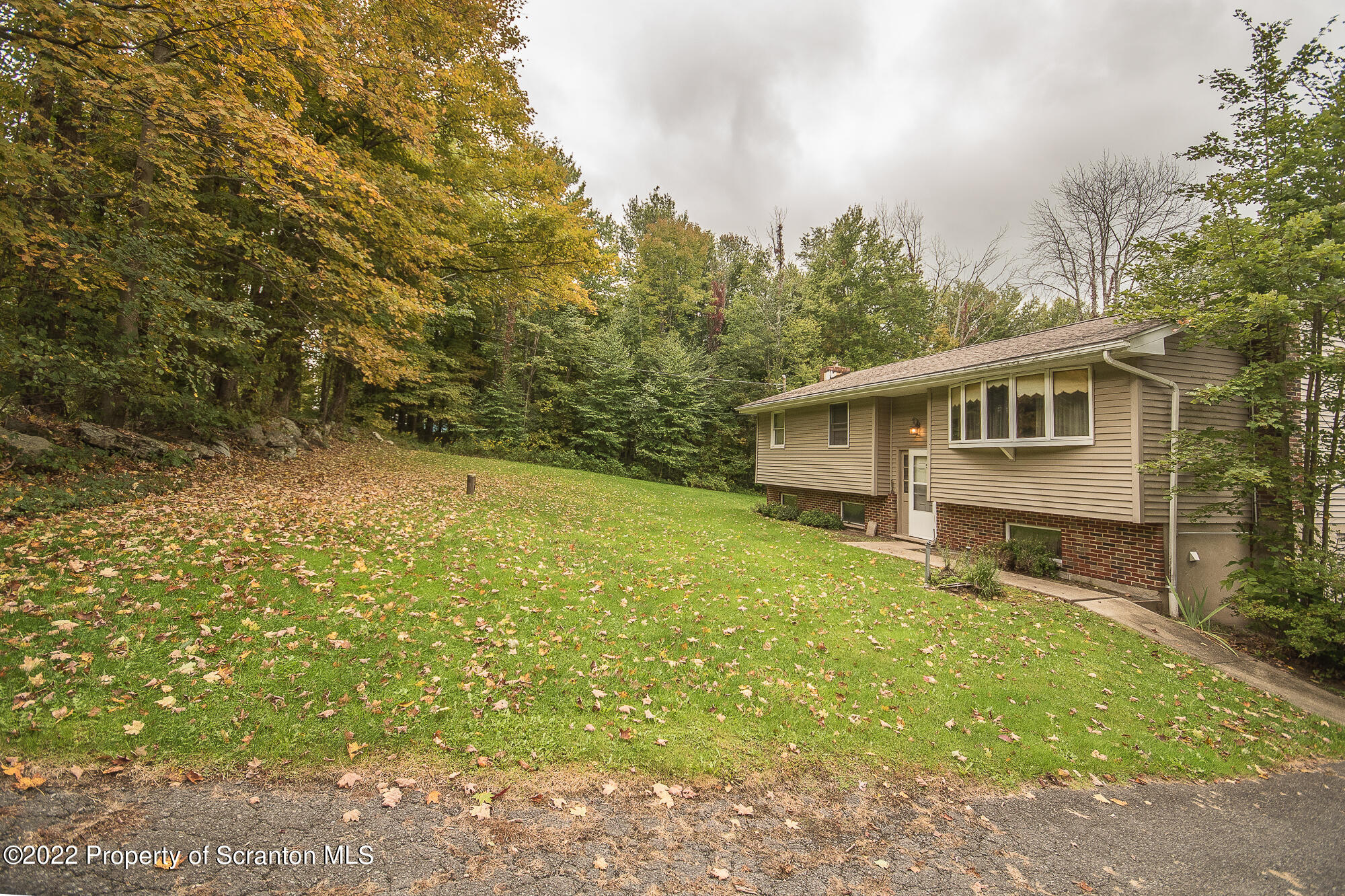 1971 Becks Crossing Road Moscow, PA 18444 - Photo 31 of 31 a view of a house with backyard