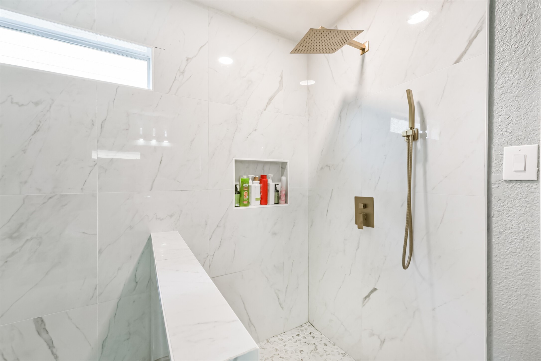 7015 Falling Cherry Place Houston, TX 77049 - Photo 23 of 42 a bathroom with a shower