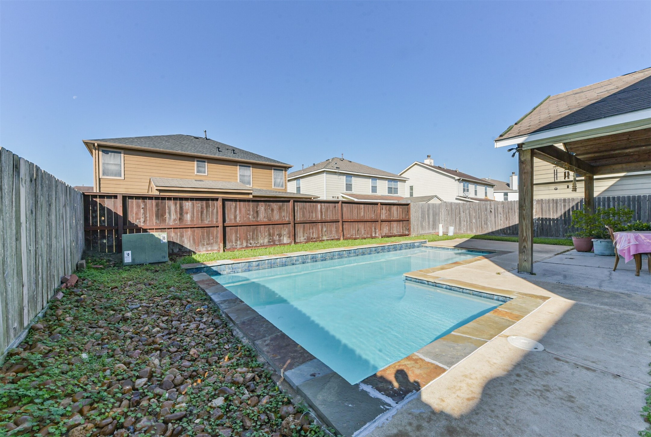 7015 Falling Cherry Place Houston, TX 77049 - Photo 40 of 42 a view of a house with backyard and porch