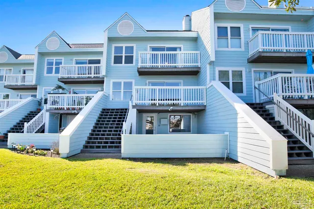 a view of a swimming pool with an ocean view
