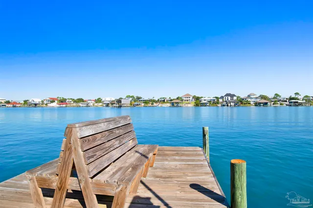 a view of a swimming pool with a sitting space