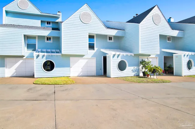 a view of swimming pool with furniture
