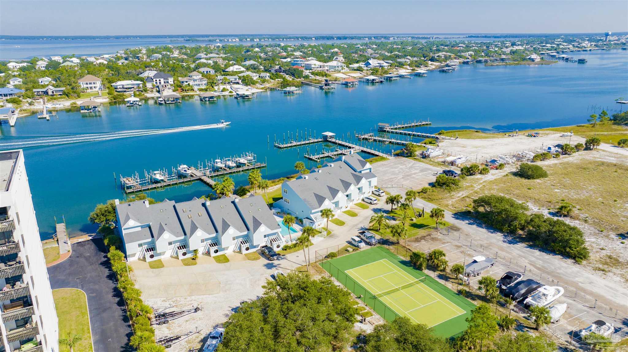 16784 Perdido Key Drive, Unit 9 Pensacola, FL 32507 - Photo 36 of 48 an aerial view of ocean and residential houses with outdoor space