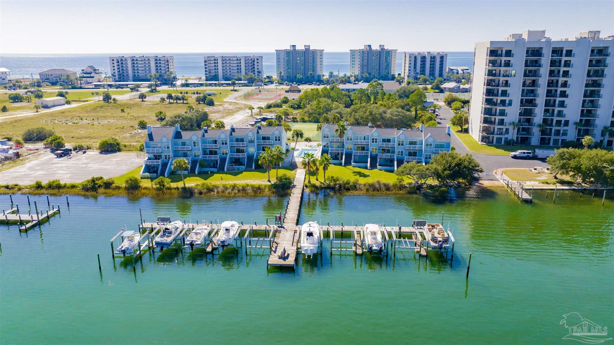 16784 Perdido Key Drive, Unit 9 Pensacola, FL 32507 - Photo 41 of 48 a view of a lake with a large trees
