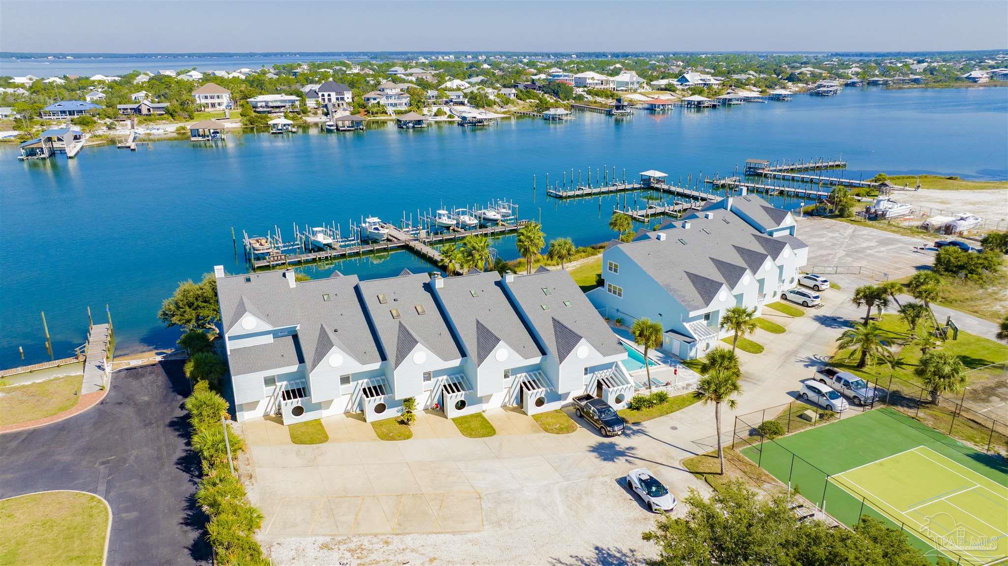 16784 Perdido Key Drive, Unit 9 Pensacola, FL 32507 - Photo 47 of 48 an aerial view of a house with a swimming pool yard and outdoor seating