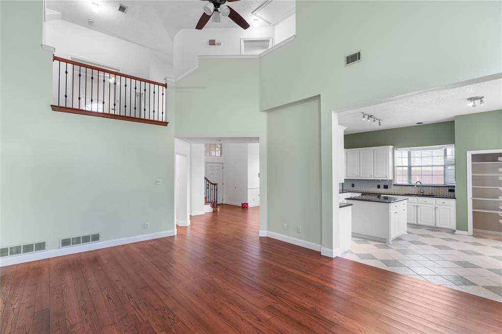 9447 Abbey Road Irving, TX 75063 - Photo 10 of 40 a view of a kitchen with a sink and a refrigerator