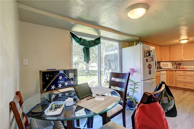 a view of a park with a sign board