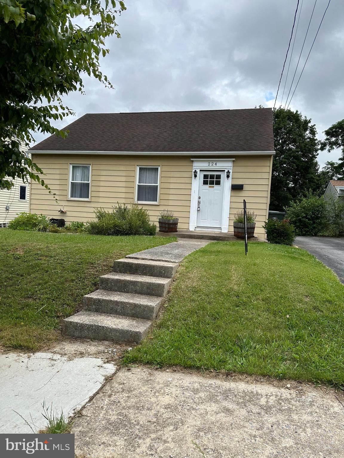224 Devonshire Road Hagerstown, MD 21740 - Photo 1 of 28 a front view of a house with a yard