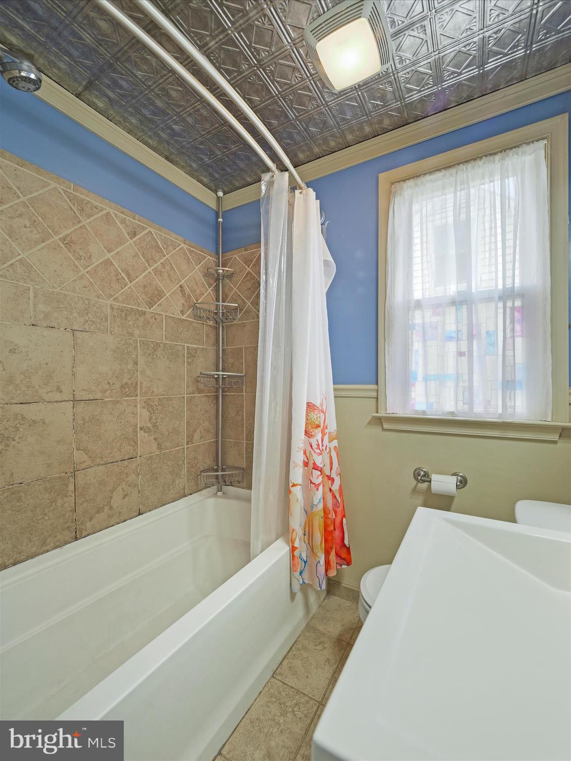 224 Devonshire Road Hagerstown, MD 21740 - Photo 18 of 28 a bathroom with a bathtub and a shower
