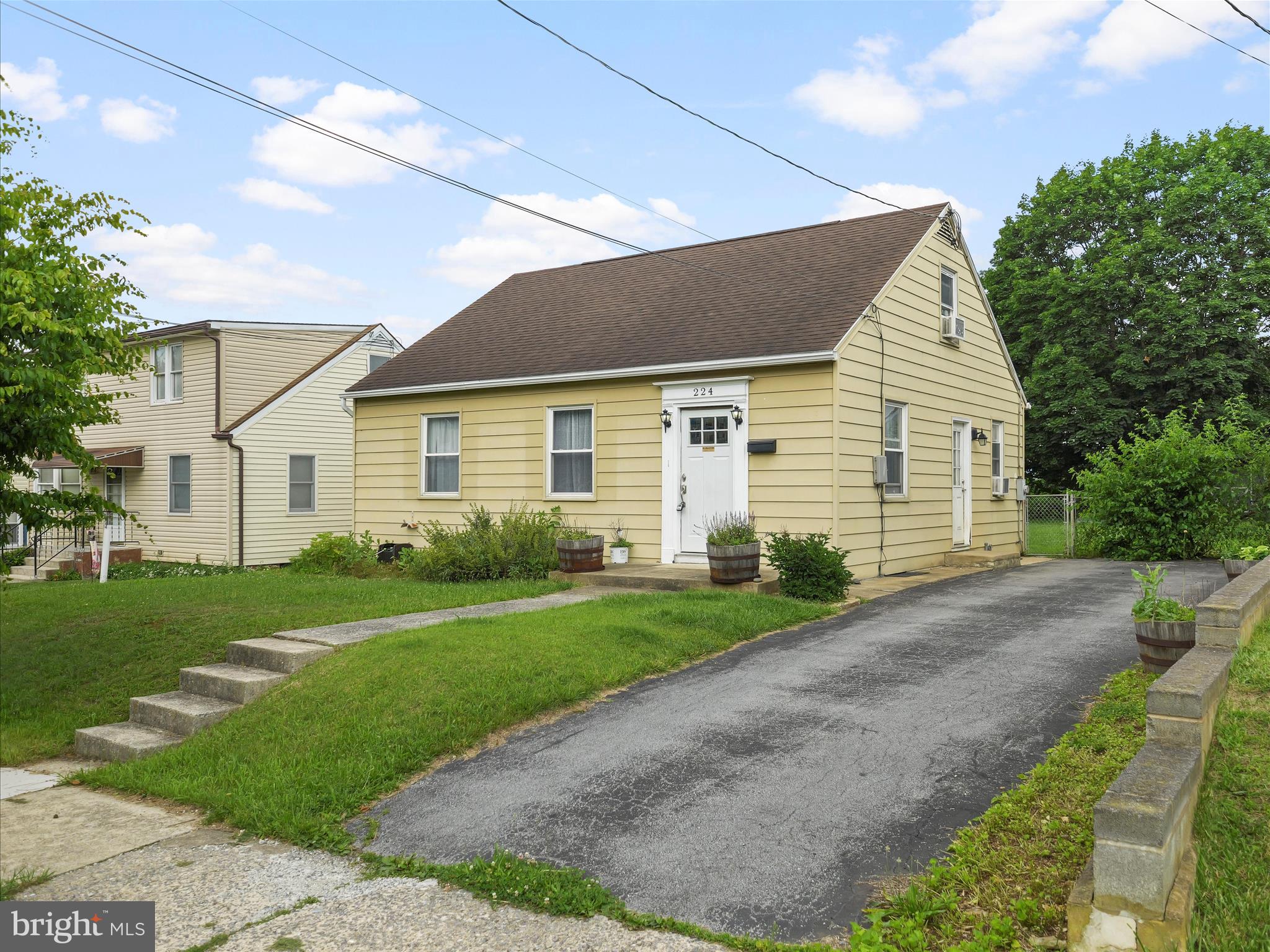 224 Devonshire Road Hagerstown, MD 21740 - Photo 3 of 28 a front view of a house with a yard