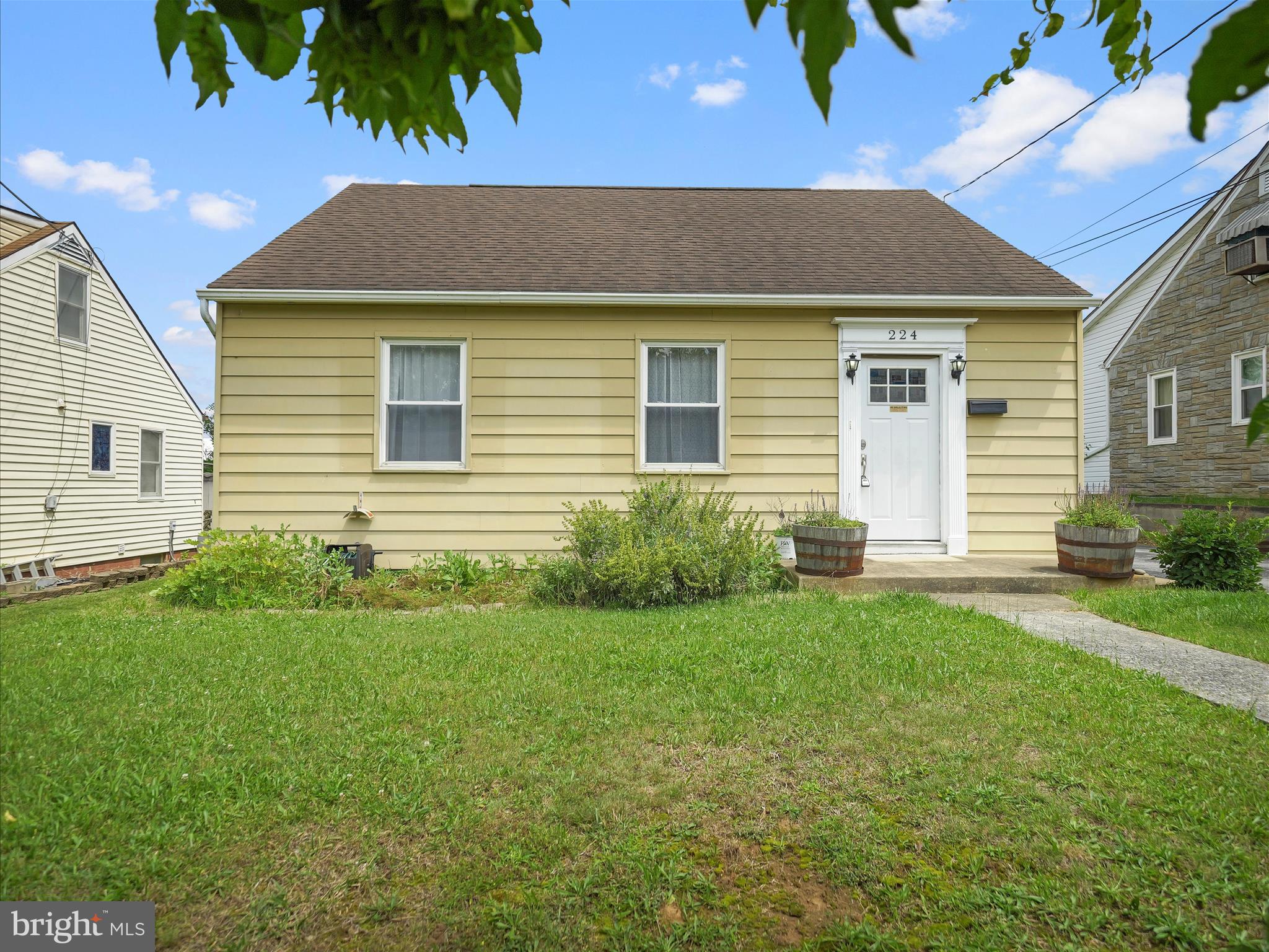 224 Devonshire Road Hagerstown, MD 21740 - Photo 4 of 28 a view of a house with a backyard
