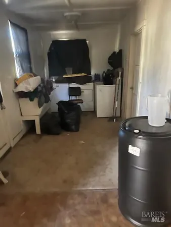 a view of livingroom with furniture and wooden floor