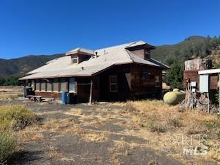 11727 Elk Mountain Road Upper Lake, CA 95485 - Photo 36 of 60 a view of a house with a yard
