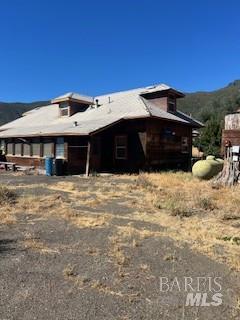 11727 Elk Mountain Road Upper Lake, CA 95485 - Photo 37 of 60 a view of a house with a yard