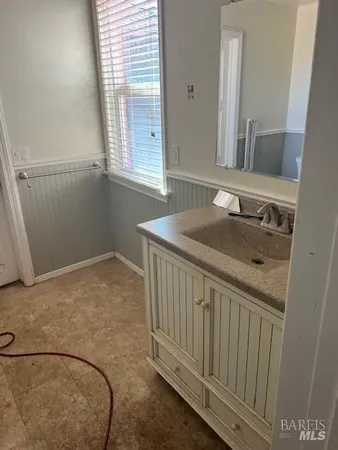 a room with furniture and window