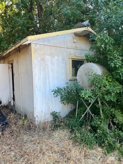 11727 Elk Mountain Road Upper Lake, CA 95485 - Photo 55 of 60 a backyard of a house with plants and outdoor seating