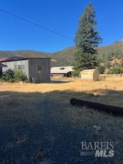 11727 Elk Mountain Road Upper Lake, CA 95485 - Photo 57 of 60 a view of a yard with an ocean view