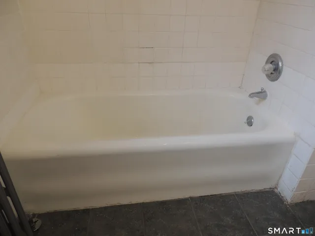a bathroom with a bathtub