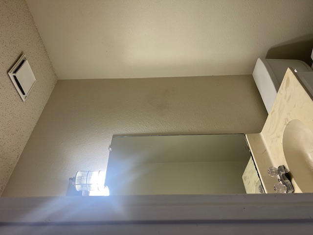 11429 Ptarmigan Drive, Unit B Austin, TX 78758 - Photo 11 of 27 a bathroom with a window