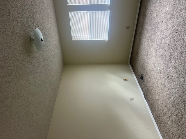 11429 Ptarmigan Drive, Unit B Austin, TX 78758 - Photo 12 of 27 an empty room with a window