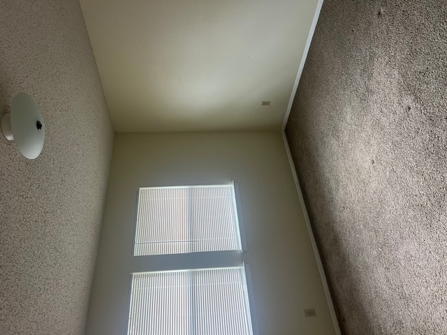 11429 Ptarmigan Drive, Unit B Austin, TX 78758 - Photo 15 of 27 an empty room with a window