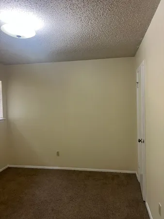an empty room with a workbench