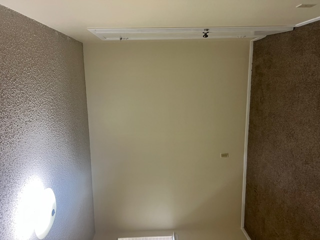 11429 Ptarmigan Drive, Unit B Austin, TX 78758 - Photo 21 of 27 an empty room with a workbench