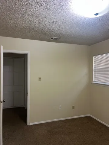 an empty room with a workbench