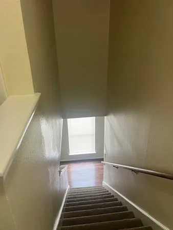 a view of a livingroom with wooden floor