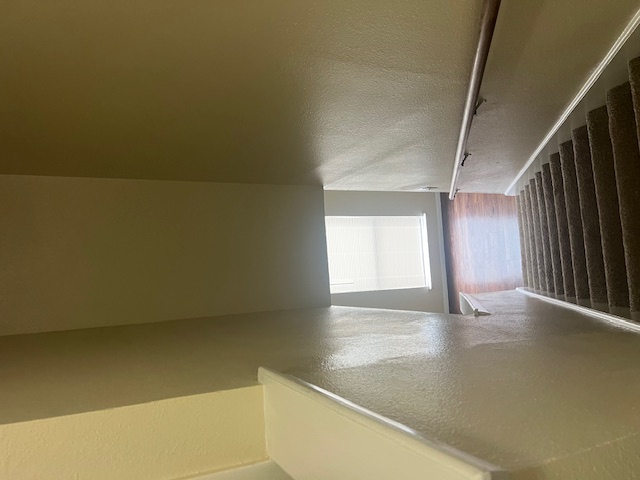 11429 Ptarmigan Drive, Unit B Austin, TX 78758 - Photo 23 of 27 a view of a livingroom with wooden floor