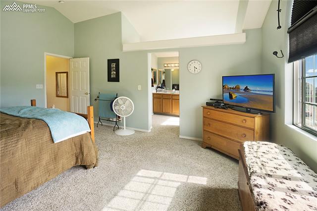 4479 Fencer Road Colorado Springs, CO 80911 - Photo 5 of 30 Master bedroom has an ensuite 5 piece bath