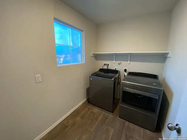 a kitchen with a stove and a refrigerator