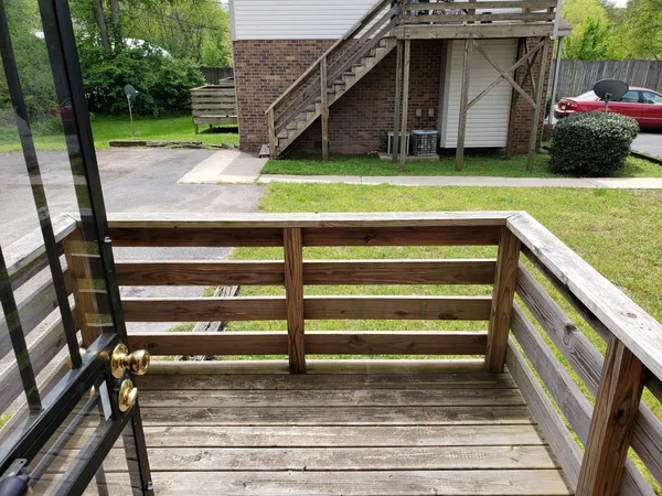a view of a house with a sink and a yard