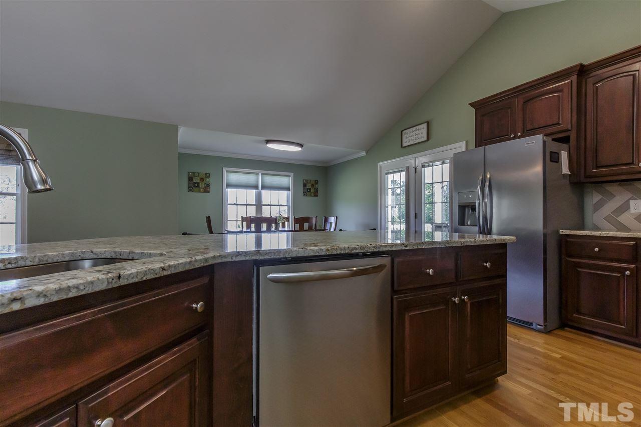 319 Boone Road Burlington, NC 27217 - Photo 11 of 30 Chef's kitchen provides views of breakfast area and family room