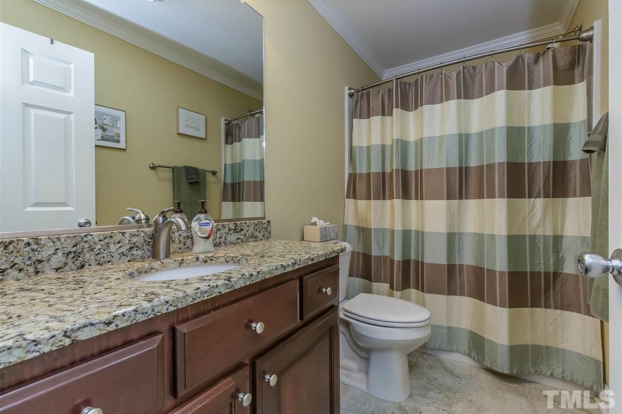 319 Boone Road Burlington, NC 27217 - Photo 20 of 30 Full bath boasts granite vanity, tile floor and shower/tub combination