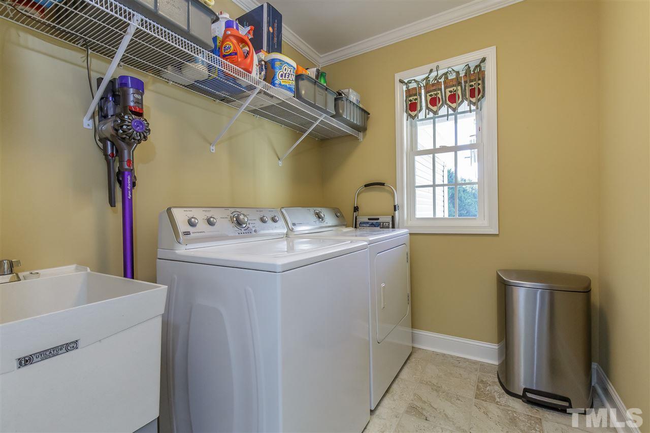 319 Boone Road Burlington, NC 27217 - Photo 22 of 30 Utility sink and upper shelf in laundry room