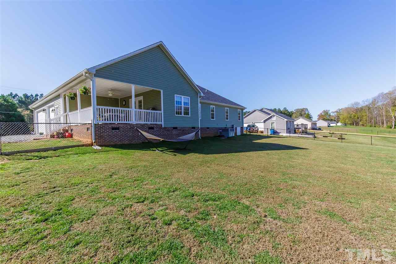 319 Boone Road Burlington, NC 27217 - Photo 26 of 30 Exterior view showing garage, side porch and back