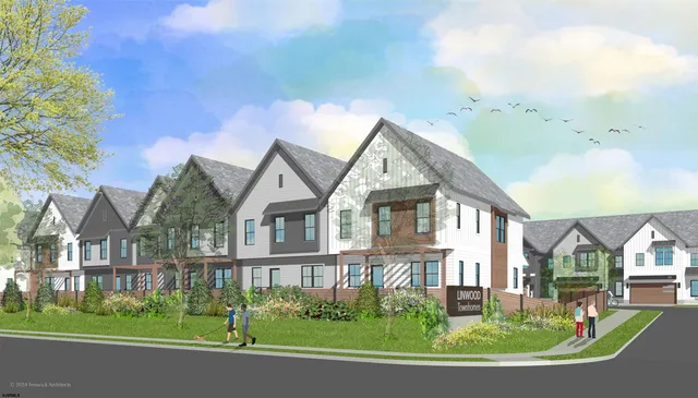 a view of a house with a yard and plants