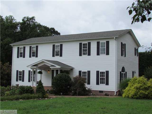 5867 Stanley Huff Road Summerfield, NC 27358 - Photo 1 of 16 Exterior Front.