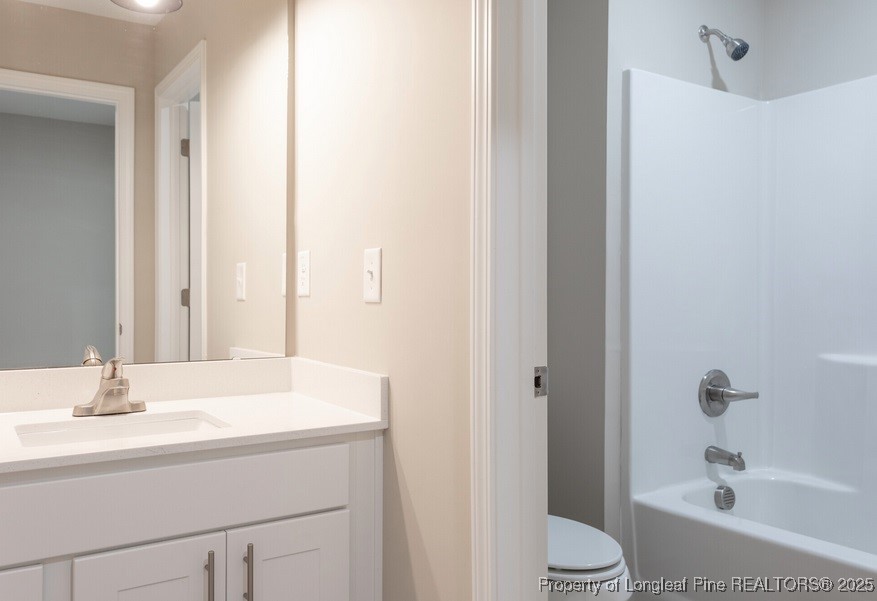 905 Kingscote Drive Fayetteville, NC 28314 - Photo 19 of 30 a bathroom with a sink a toilet and shower