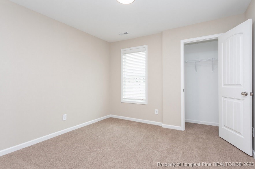 905 Kingscote Drive Fayetteville, NC 28314 - Photo 21 of 30 a view of an empty room with a window