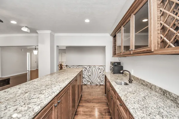 a kitchen with a stove and a sink
