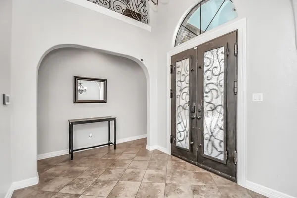 a view of an entryway with a door
