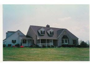 599 Old White Bridge Road Waynesboro, VA 22980 - Photo 1 of 3 a front view of a house with a garden
