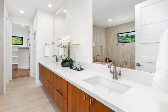 a spacious bathroom with a shower