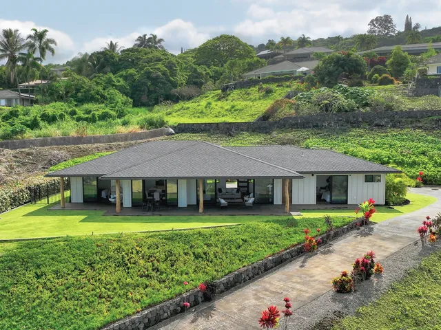 an aerial view of a house with garden