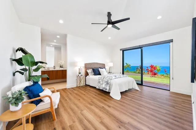 a bathroom with a double vanity sink toilet and a mirror