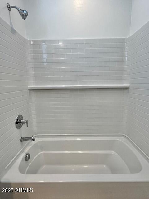 3341 South Lotus Mesa, AZ 85212 - Photo 19 of 42 a bathroom with a tub