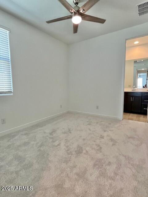 3341 South Lotus Mesa, AZ 85212 - Photo 20 of 42 an empty room with a window and a fan