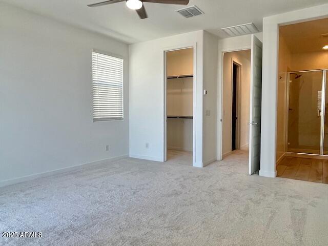 3341 South Lotus Mesa, AZ 85212 - Photo 24 of 42 an empty room with closet and windows
